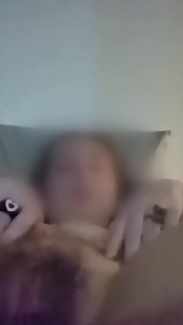 random video in bed #1 [vertical]